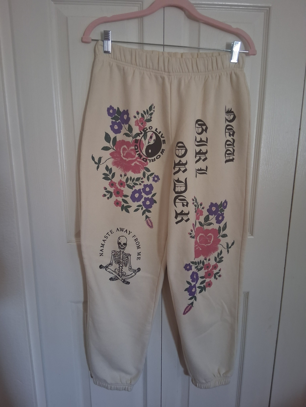 Cream Floral Graphic Sweatpants with Pink & Purple Accents